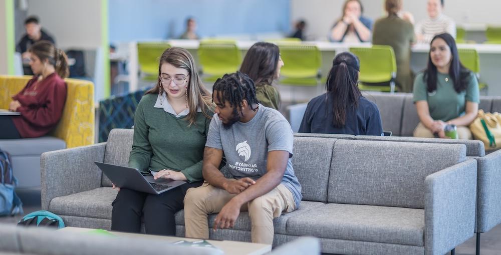 Student studying in Kinne Center